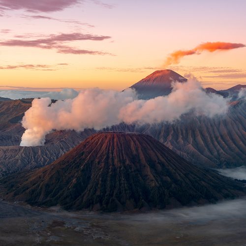 Landscape shot of three volcanoes at sunrise on the Indonesian island of Java.