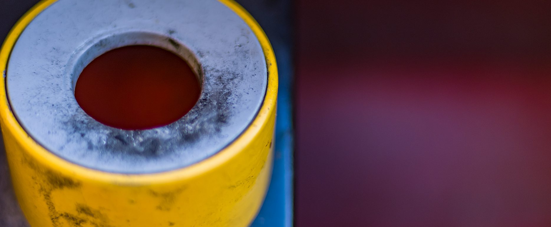 Urban close-up of an ashtray built into a public dustbin.