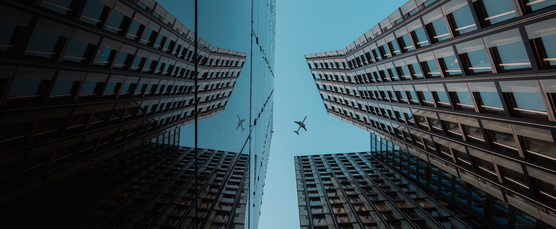 Architecture shot of the two high-rise buildings with reflection.