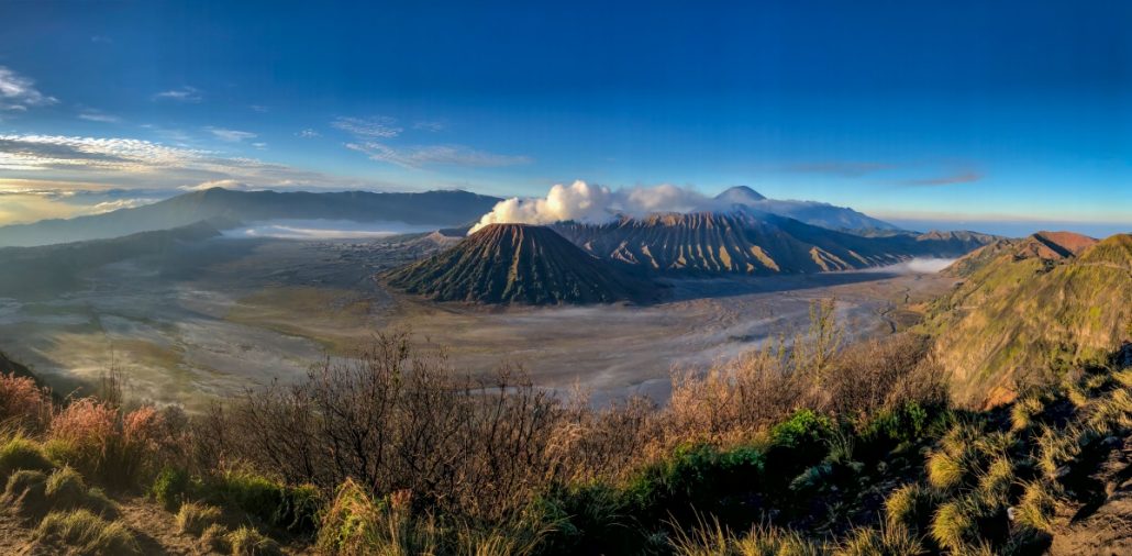 Landscape photograph of three volcanoes.