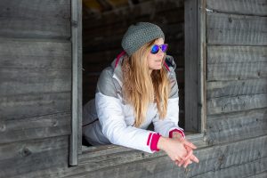 Portrait shot of a woman in winter clothes.