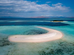 Aerial view on a sandbank with pink sand.