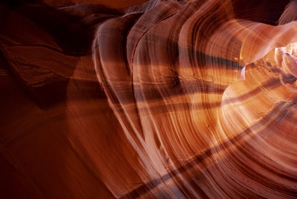 Landscape shot of a red sandstone crevice in Antelope Canyon.