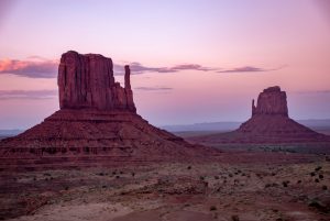 Landscape shot of two single rocks at sunset.