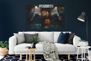 Photo of a living room with painting above the sofa.