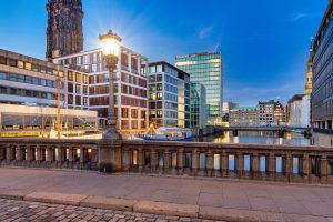 Night shot of a bridge with streetlight at a city fleet.