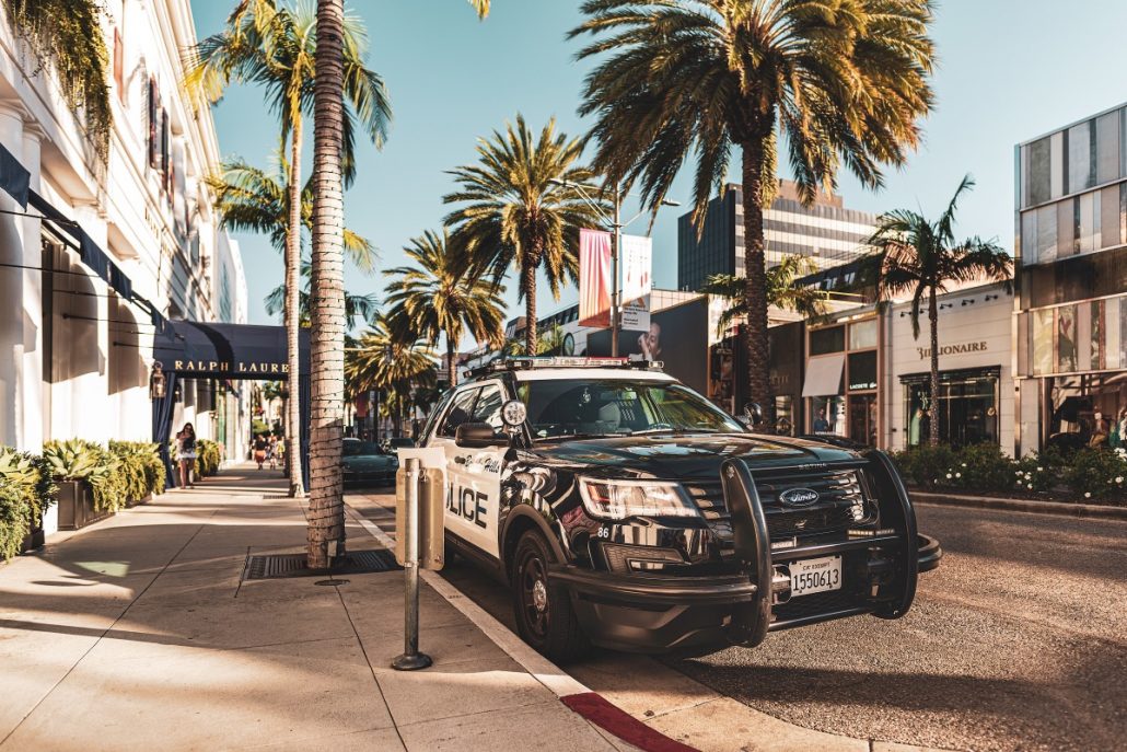 Urban shot of a police car on Rodeo Drive.