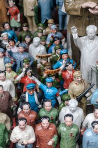 Urban close-up of clay figures.